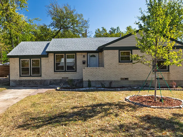 Charming brick home with modern updates and a welcoming front yard. Enjoy a peaceful stay in a quiet neighborhood, just minutes from dining, shops, and more.