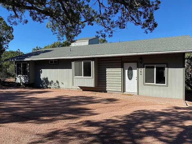 South-facing front of the home with circular driveway