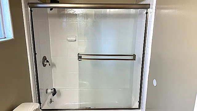 Freshened bathrooms with his and hers