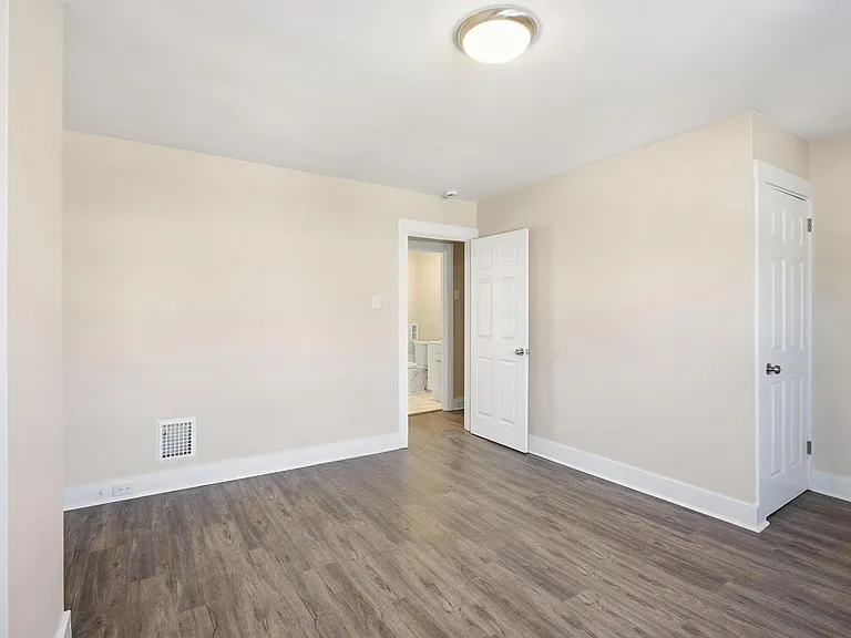 Charming Updated 2BR Home with New Flooring & Rear Porch — Photo 7