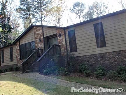 Front of home
						:
						Cedar siding and stone for a warm, rustic feel.