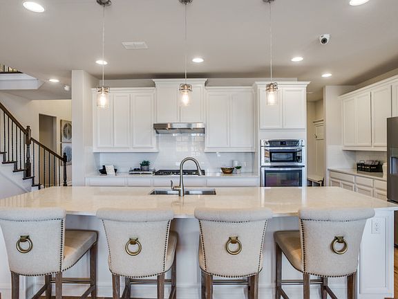 Model Representation - Stunning open island kitchen with eat-in bartop