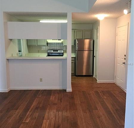 4th image of 8681 Key Royale Ln APT 302