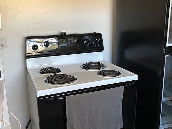 Full size stove and fridge