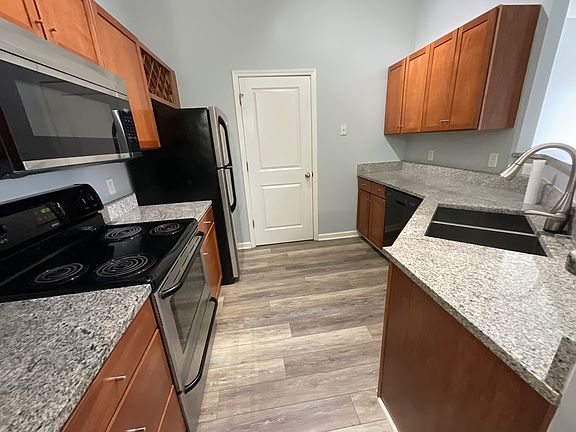 Kitchen with marble countertops.