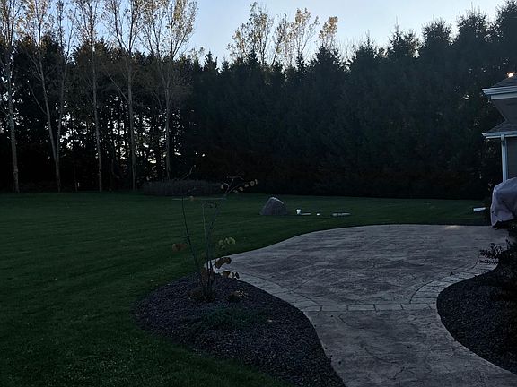 Back of house with large patio for entertaining and cook-outs