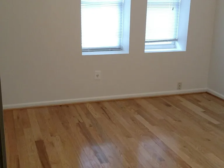 Bedroom with high ceiling