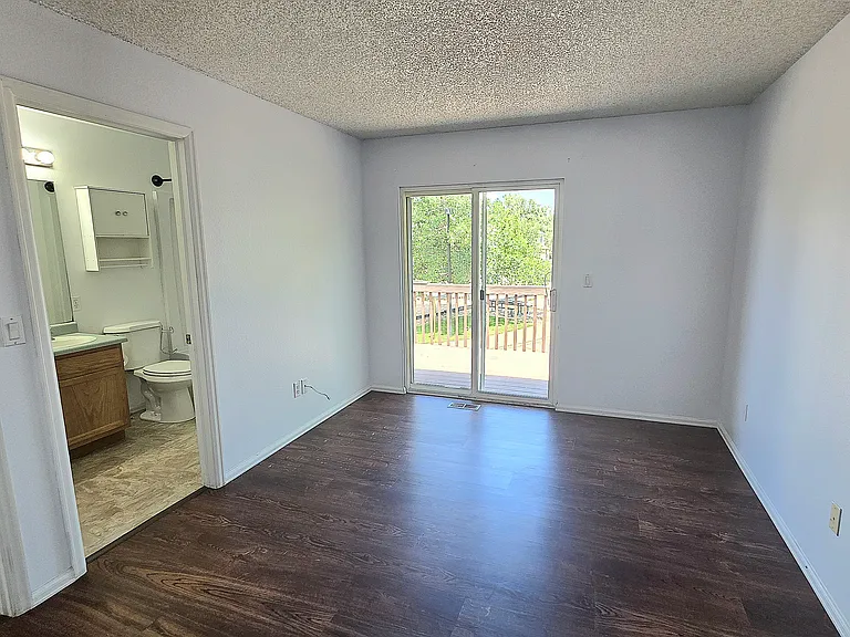 Primary bedroom and en-suite full bathroom