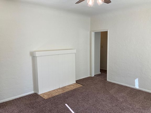 Living Room with Faux Fireplace