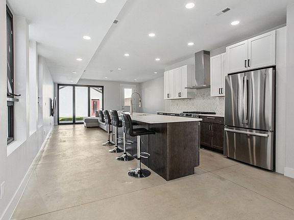 Kitchen facing into living room
