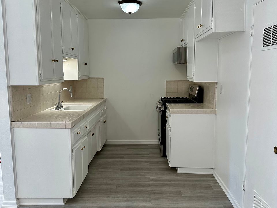 Roomy kitchen with lots of storage. Gas stove and microwave oven included.