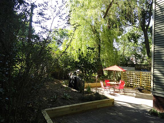 landscaped back yard & Patio w/ bike storage