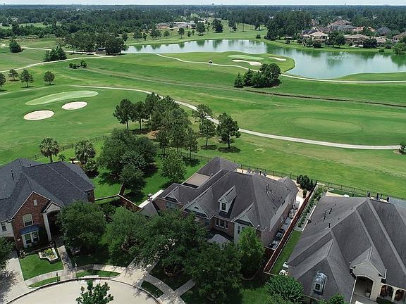 Tremendous placement of home on the golf course with water views and cart path set far back from home for optimum privacy. Personal gate on back iron fence for your use!