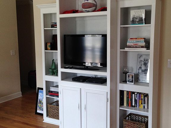 Built In Shelving in Living Room with 32 inch Flat Screen TV