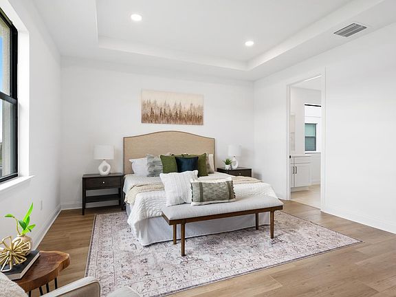 Spacious primary bedroom suite