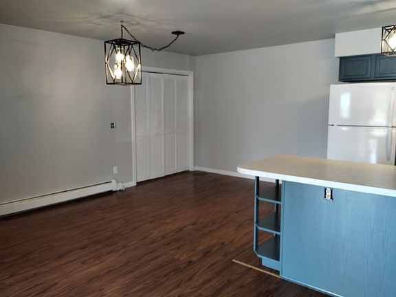 Dining area, laundry closet and kitchen