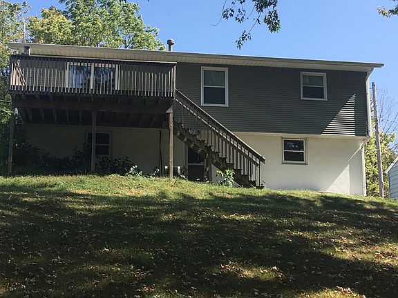 Back with deck to backyard