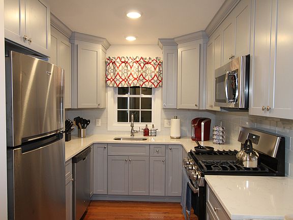 Updated designer kitchen with granite countertops