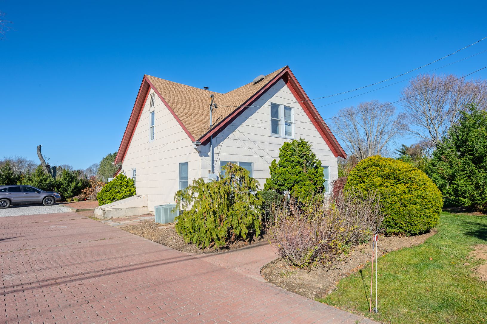 Large parking area in front of house