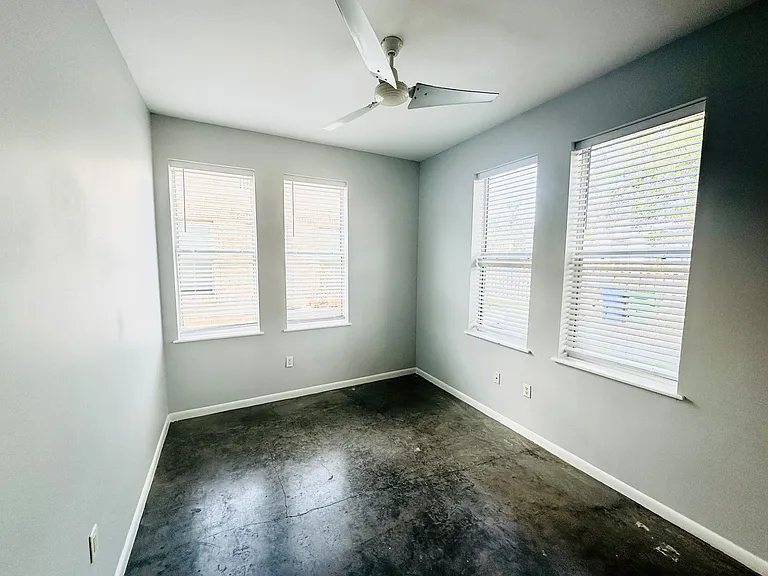 Downstairs Bedroom with closet. Comes with blinds.