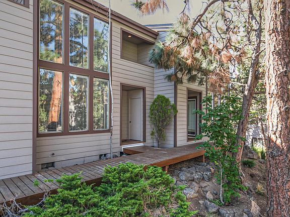 Front door and storage closet. Balcony upstairs.
