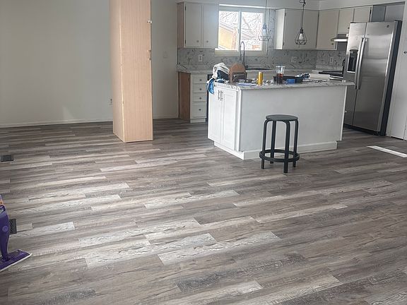 View from corner of upstairs. Kitchen and living are open