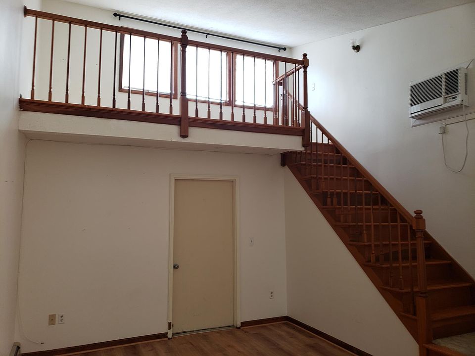 Loft area with view of Thames River