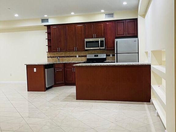 4th image of 1554 59th St #1