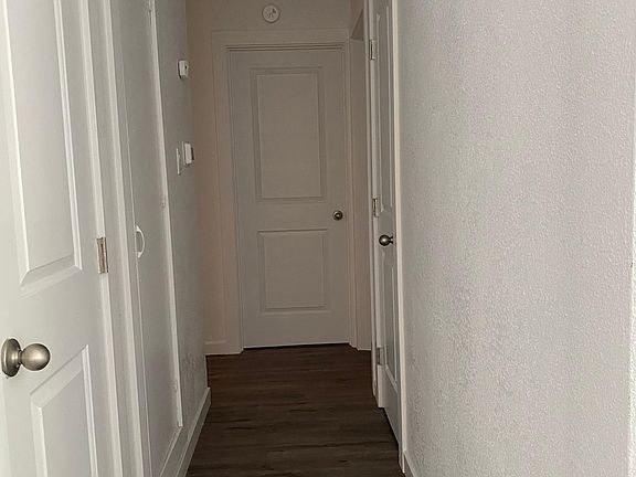 Hallway with closets