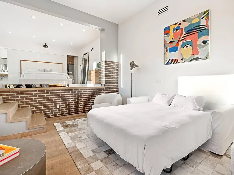 Unwind in the chic living space of Guest Bedroom #3, offering a perfect blend of elegance and comfort.
