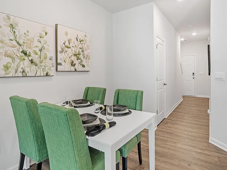 Dining area facing front door entryway