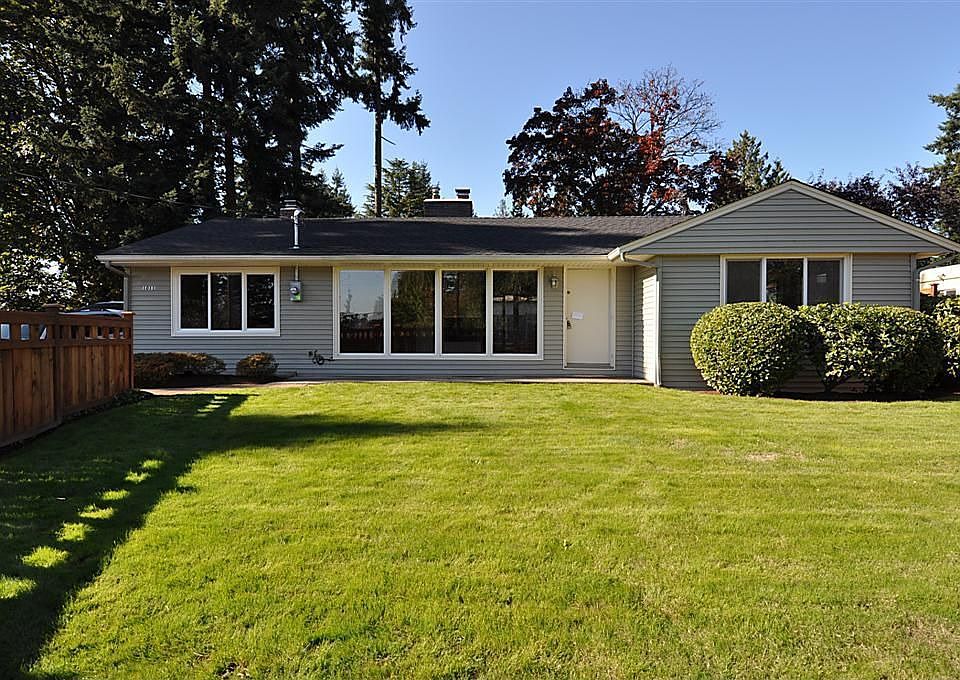 East elevation from fenced yard