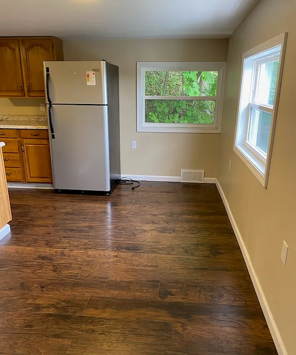 kitchen viewed from living room, showing area for location of table