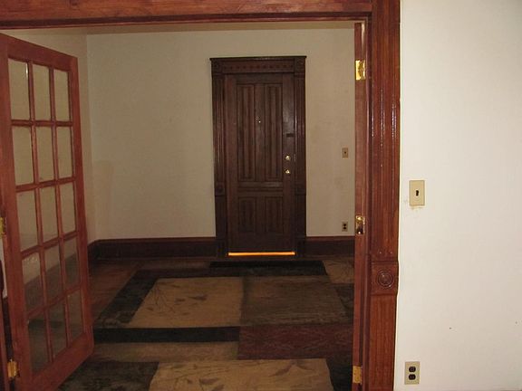 Living room and bedroom have hardwood floors
