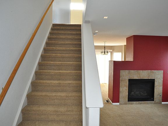 Stairs just inside front door