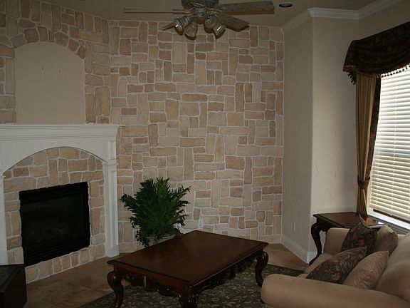 2nd Living area with gorgeous stone wall