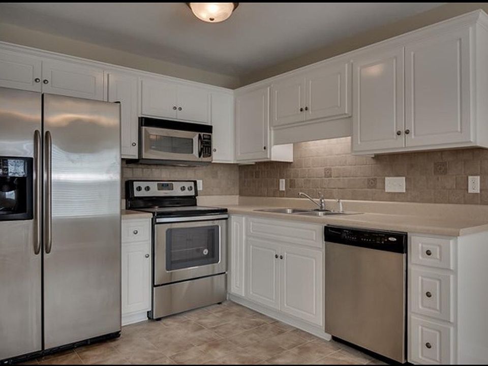 before updating the flooring, faucet, fridge, and