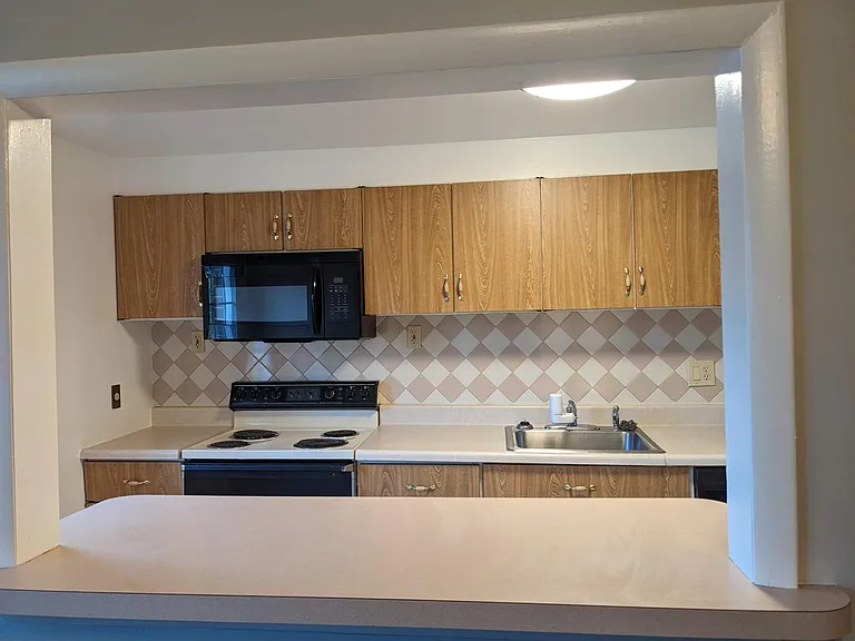 Breakfast Bar into Kitchen
