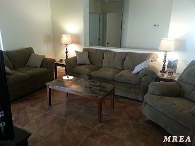 Large Living Room with Sliders to Patio