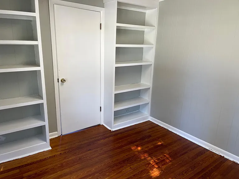 Front Bedroom with refinished hardwood floors.