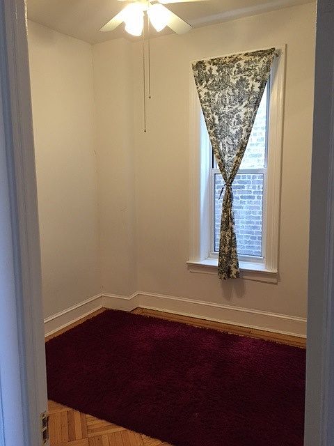 Bedroom with light from ceiling fan