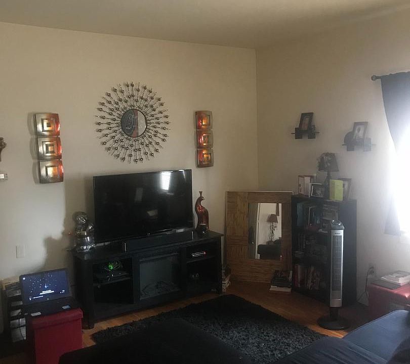 Living room with Hardwood floors.