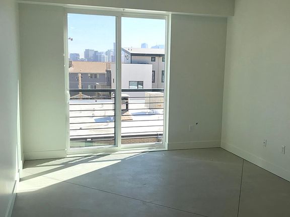 Standing in kitchen looking into living room