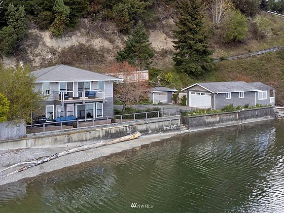 Easy parking for AirBnB guests.  The garage on the right side of the photo is good sized.  At the back end you can see the studio/office/guest room/extra AirBnB rentable space.