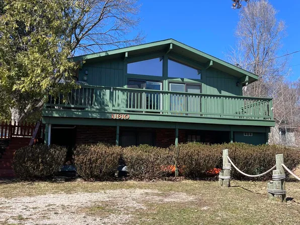11610 SW Torch Lake Dr, Rapid City, MI 49676