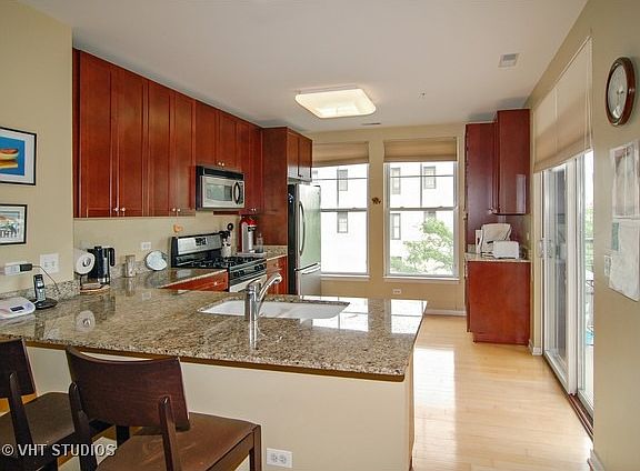 4th image of 7243 Madison St APT 218