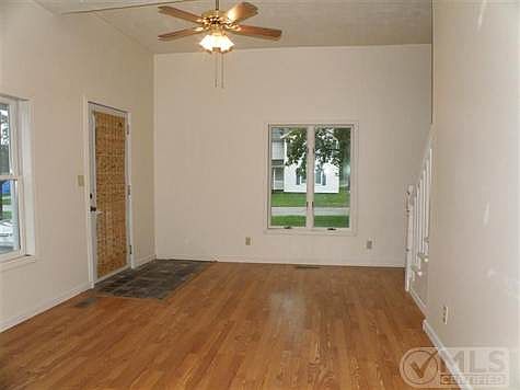 Photo:  Front entry room is small for a living room, but with the additional room off kitchen, there is ample living space for a smaller group.
