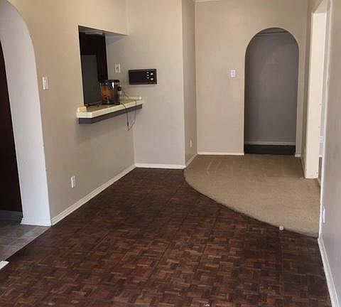 Dining Room with Parquet Flooring and open counter space to kitchen Can be a breakfast bar or work space