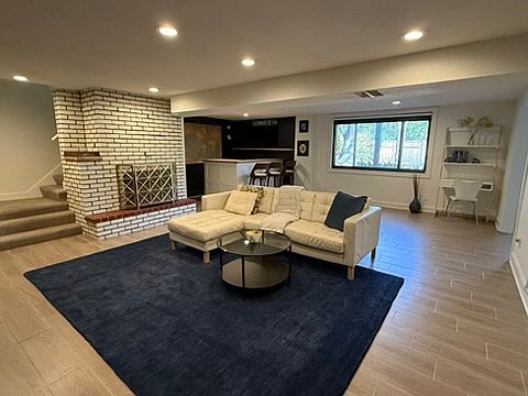 Lower level family room with a walkout to backyard