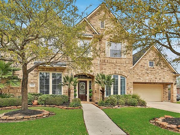 Surrounded by beautiful trees, 20415 Misty Crossing is just over 4,000 sq ft. Roof was replaced in 2018.